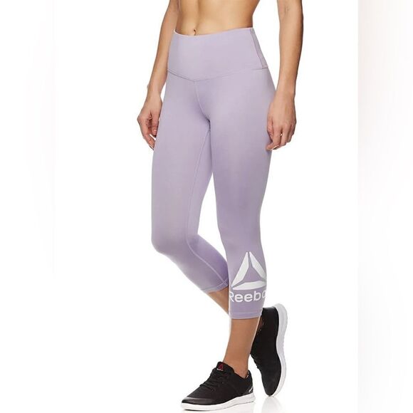 Stay Fit in Style: Reebok Women's Wanderlust Capri Compression Athletic Pants - Picture 1 of 2